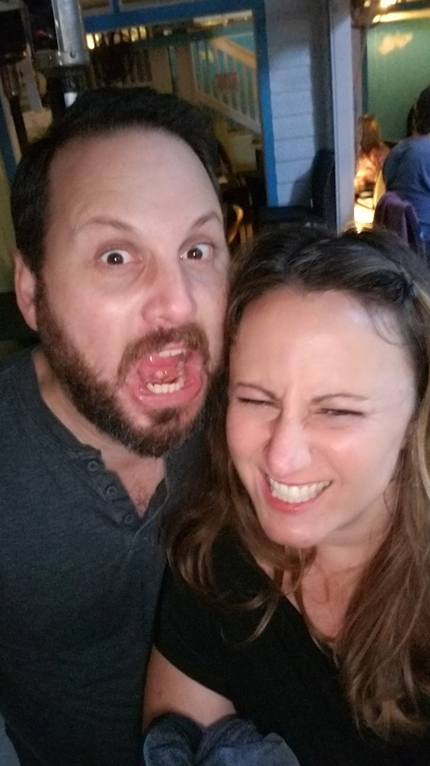 Chris and Tami of Fox Trail Craftworks — makers of handmade knives and fire‑protection‑inspired gifts — sharing a playful moment.