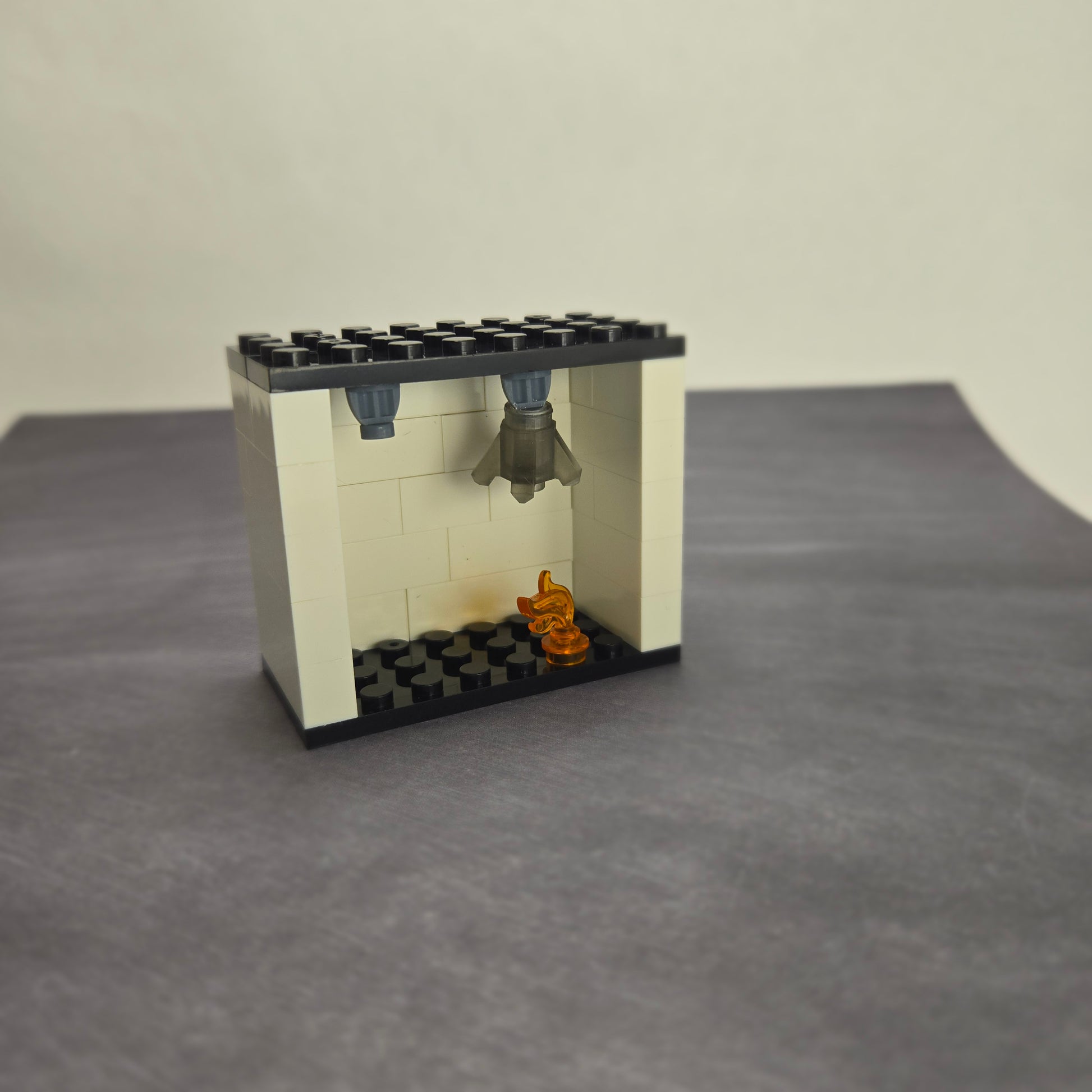 Single fire sprinkler demo kit assembled with flame and smoke crystal in the sprinkler element, showing how real sprinkler water can appear dirty.