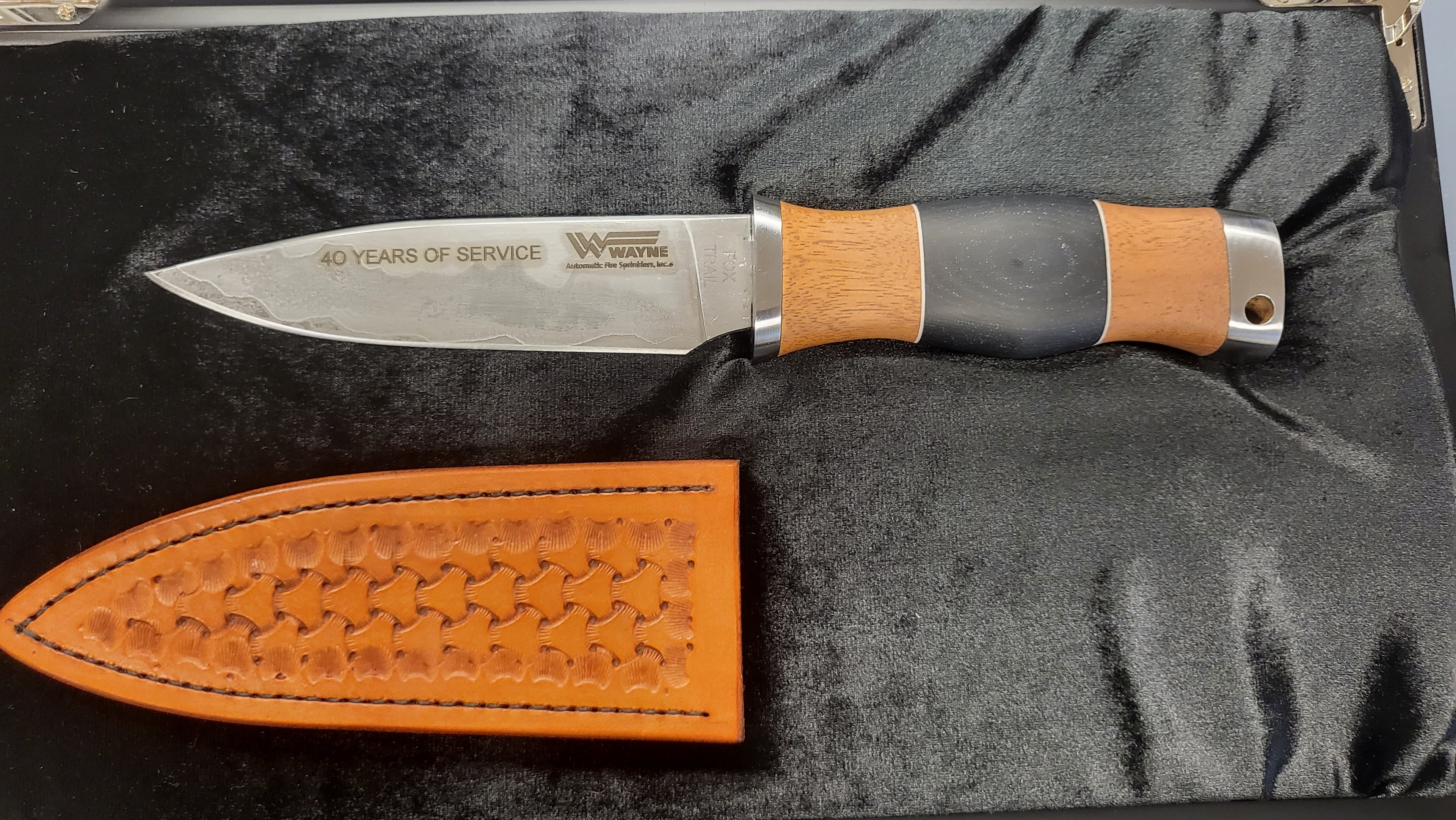 Load video: Video of a hand-forged Go Mai custom knife made from historic railroad spikes and signature micarta, created to honor 40 years of service.